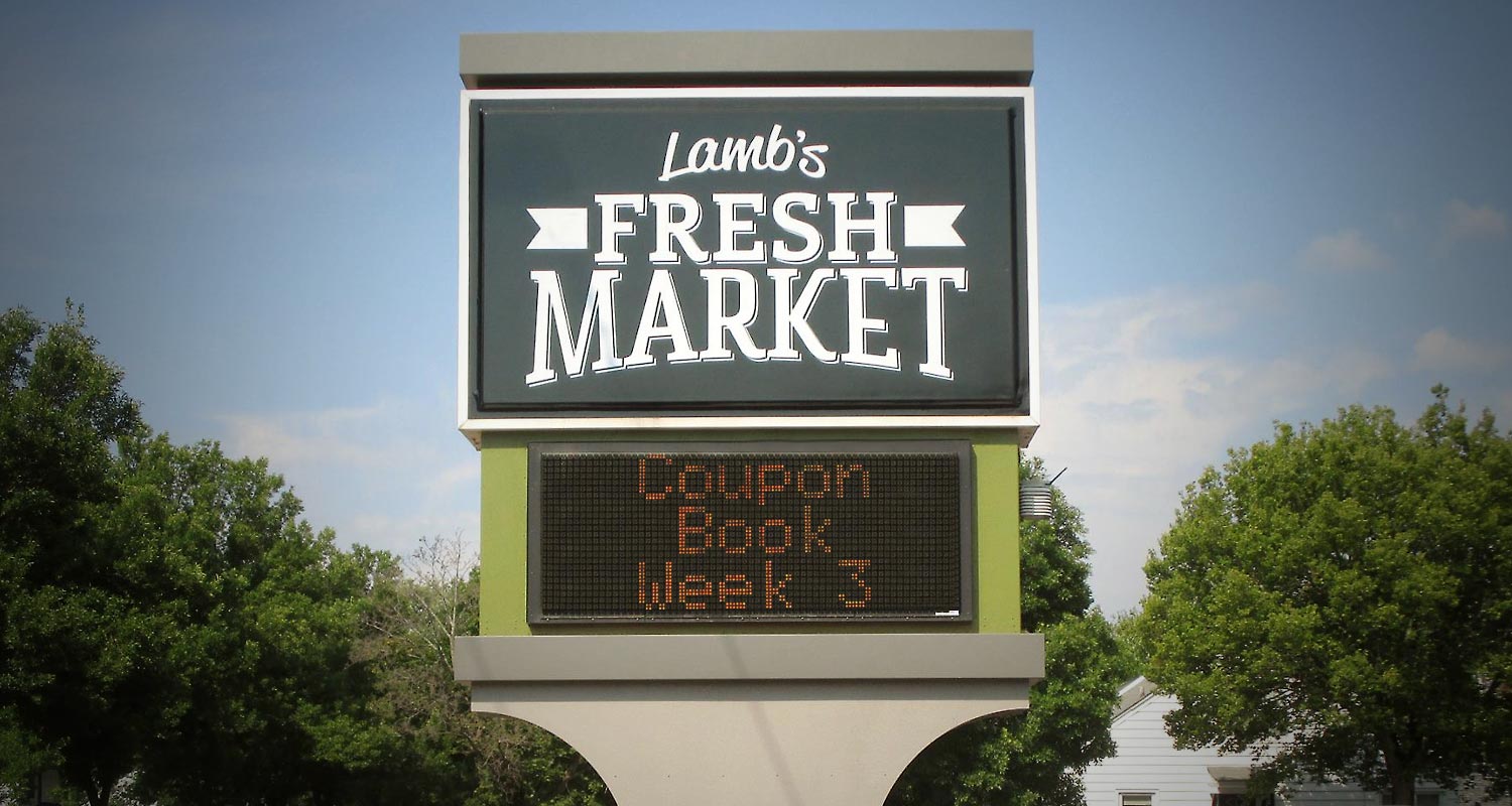 Lamb's Fresh Market store signage with logo